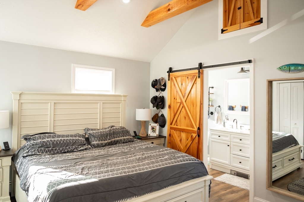 8 South Road Westminster, MA 01473 - Photo 13 of 28 a bedroom with a bed and wooden floor