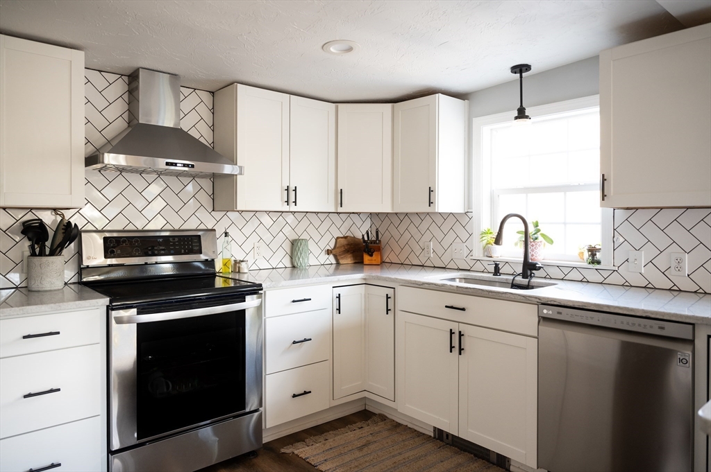 8 South Road Westminster, MA 01473 - Photo 3 of 28 a kitchen with cabinets appliances a sink and a window