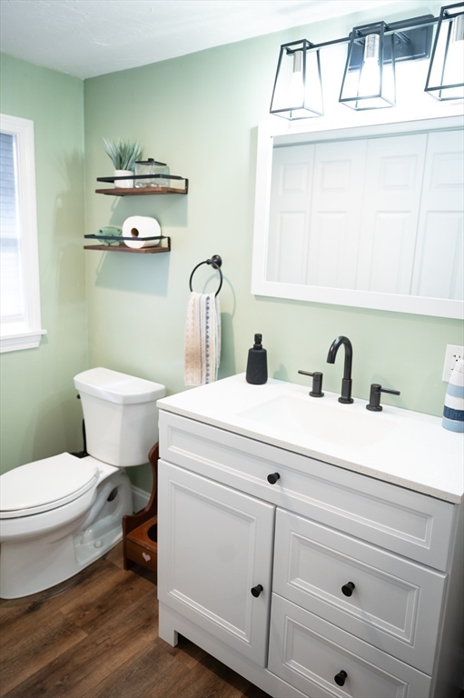 8 South Road Westminster, MA 01473 - Photo 8 of 28 a bathroom with a sink a toilet and a mirror
