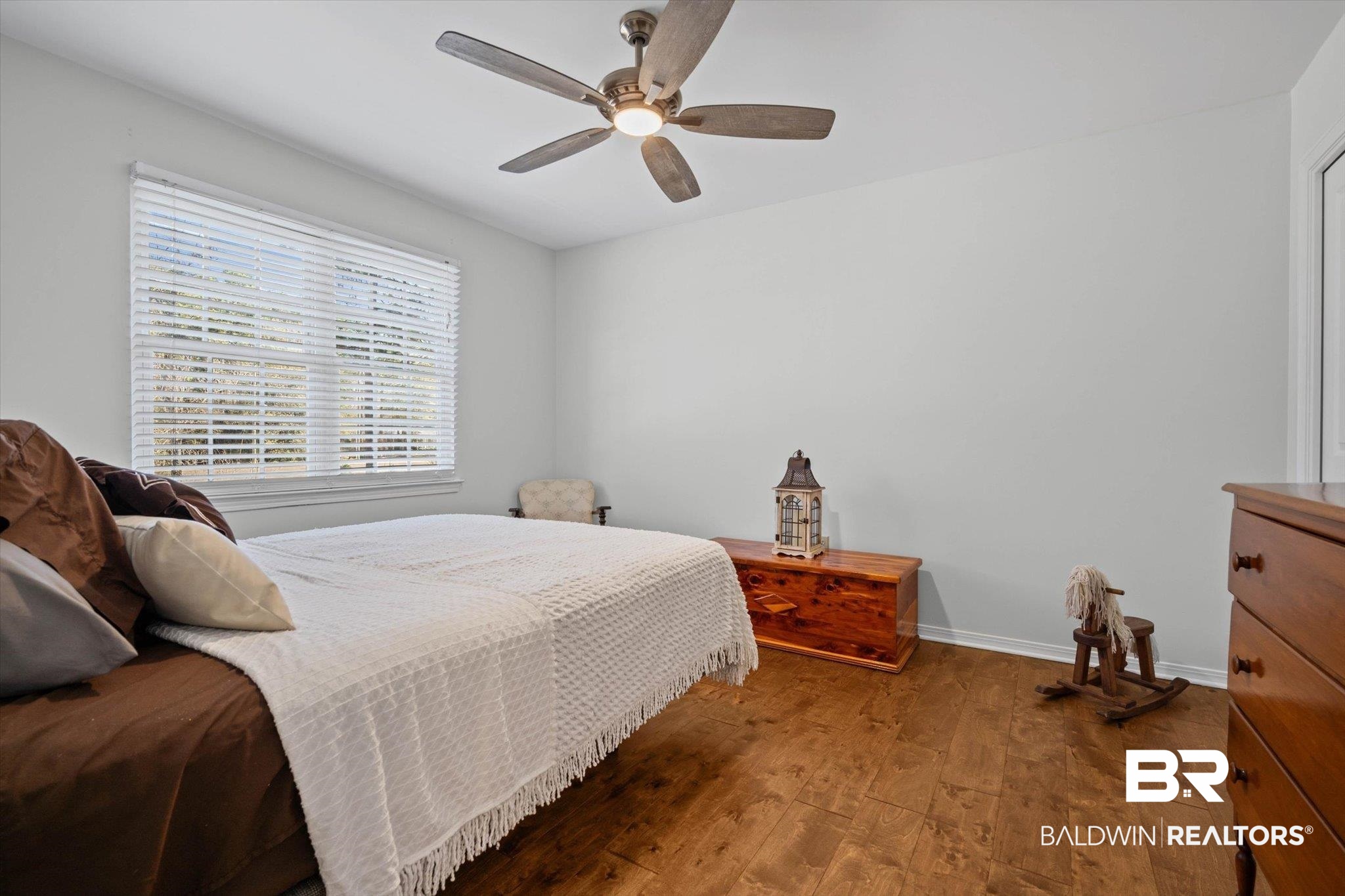 31369 Blakeley Way Daphne, AL 36527 - Photo 16 of 38 Bedroom featuring dark wood-type flooring and a ceiling fan