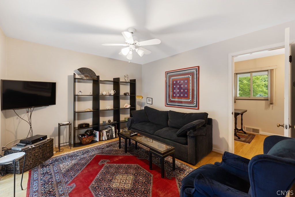 108 Archer Road Syracuse, NY 13207 - Photo 21 of 44 Family room with slider to deck
