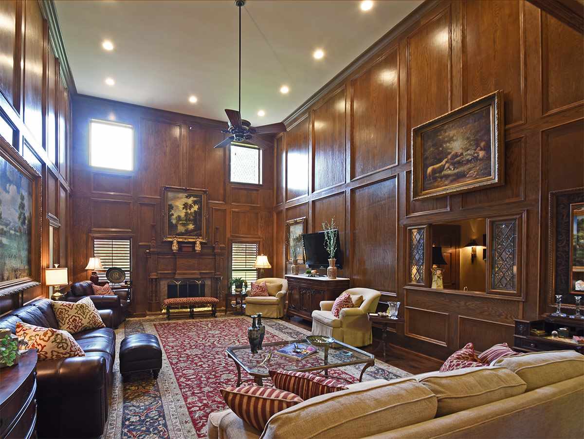 2764 Johnson Road Germantown, TN 38139 - Photo 4 of 25 The great room is designed for family fun and for entertaining guests comfortably. The warm woods covering the walls,the fireplace and the large wet bar give a cozy, yet elegant, feel to the room.