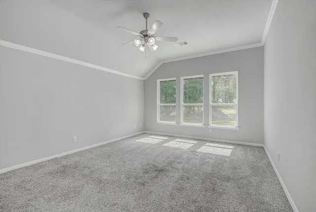 a spacious bathroom with a bathtub sink and mirror