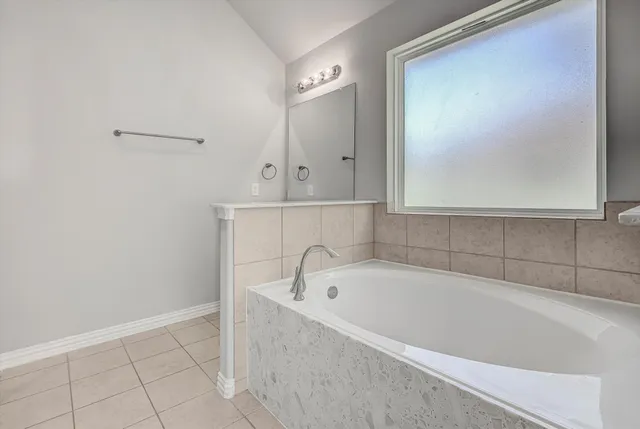 a bathroom with a shower and toilet