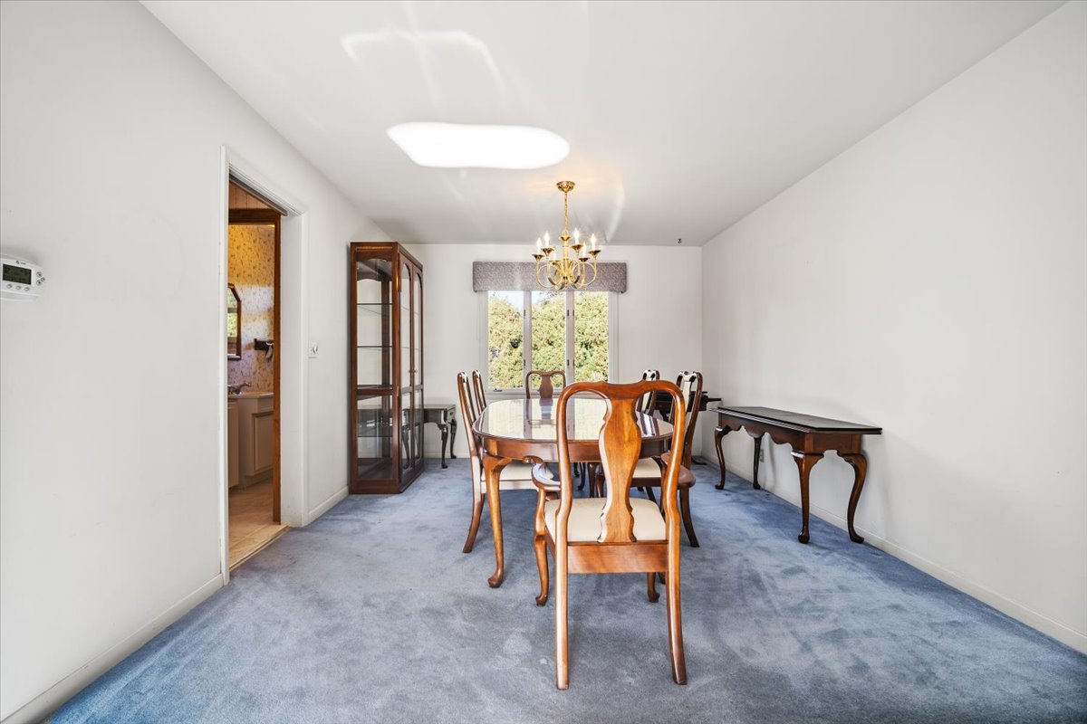 206 Imperial Drive Bloomington, IL 61701 - Photo 17 of 37 a view of a dining room with furniture and chandelier