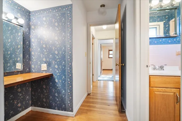 a view of a bathroom with a tub and shower