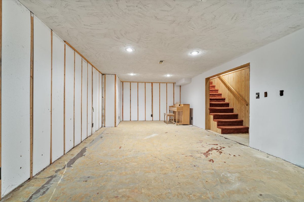 206 Imperial Drive Bloomington, IL 61701 - Photo 26 of 37 a view of a room with stairs and a hallway