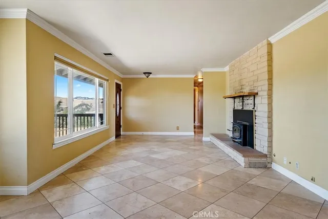 a view of livingroom with furniture and a window