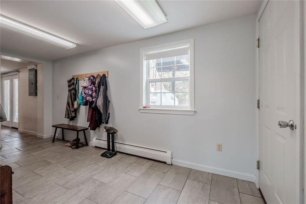 576 Long Plains Road Buxton, ME 04093 - Photo 4 of 35 Large mudroom off of the garage in...