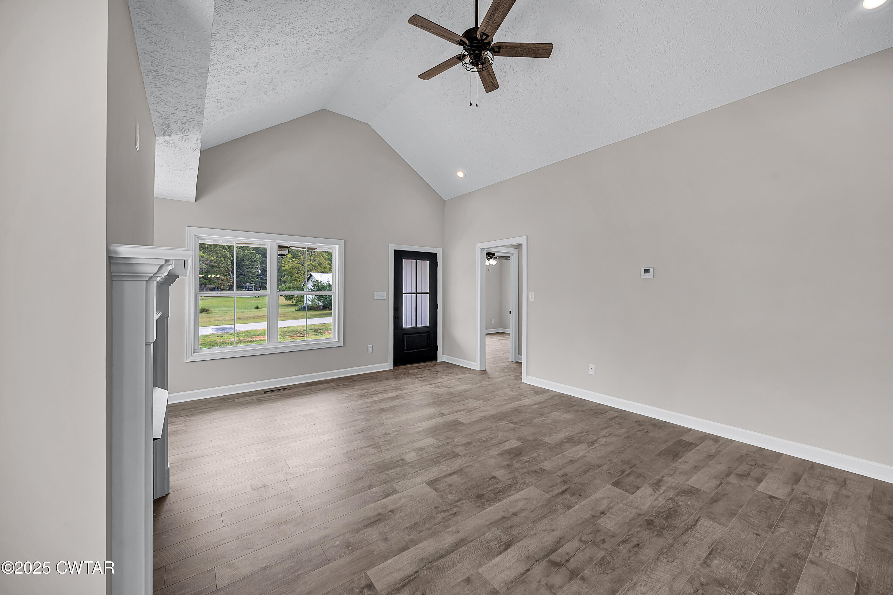 757 Christi Loop Henderson, TN 38340 - Photo 10 of 21 a view of an empty room with a window