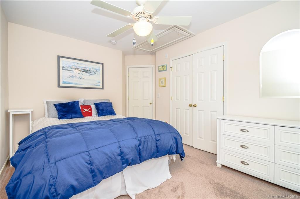 15739 Trenton Place Road Huntersville, NC 28078 - Photo 10 of 16 a bedroom with a large bed and a closet