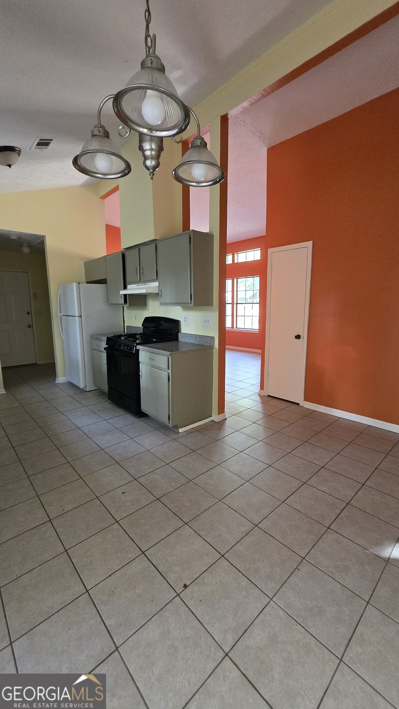 2416 Newgate Drive Decatur, GA 30035 - Photo 11 of 16 a kitchen with stainless steel appliances granite countertop a sink and cabinets