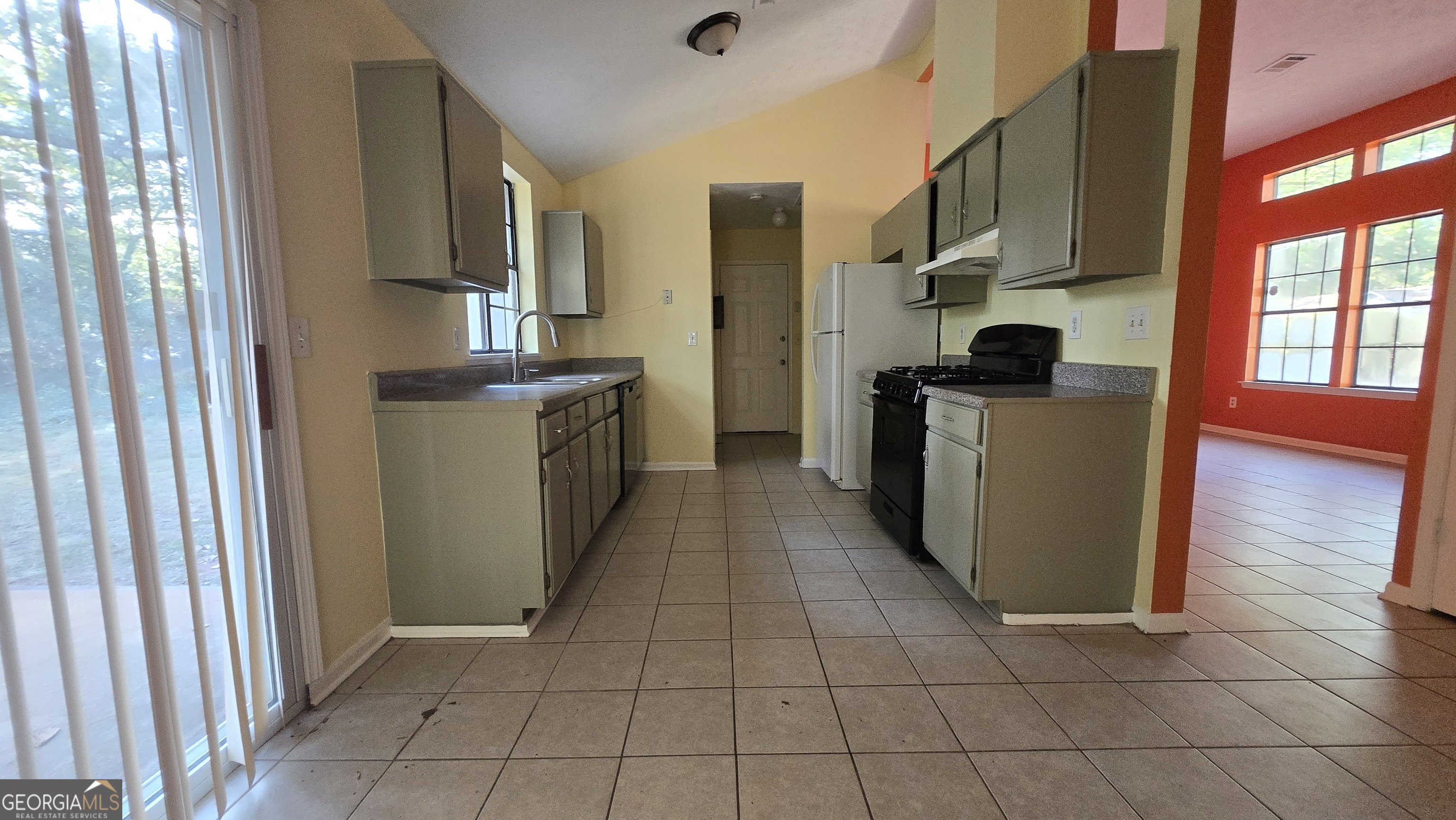 2416 Newgate Drive Decatur, GA 30035 - Photo 12 of 16 a kitchen with stainless steel appliances granite countertop a refrigerator and a stove