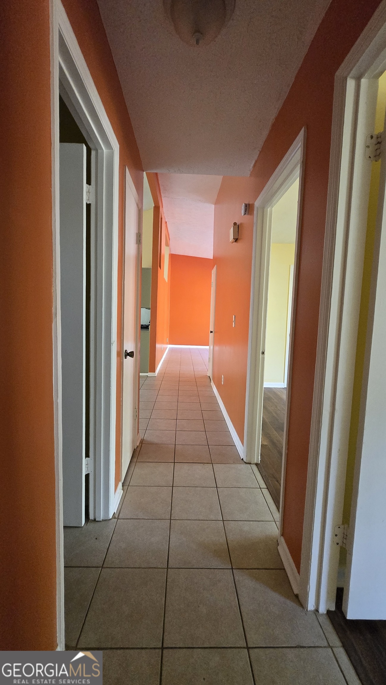 2416 Newgate Drive Decatur, GA 30035 - Photo 10 of 16 a hallway with a large window and doors