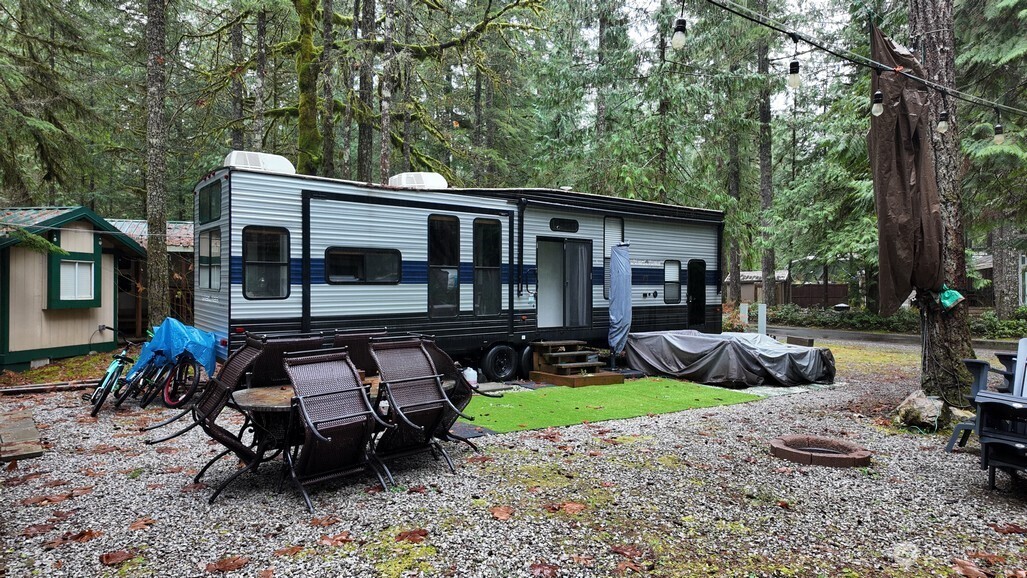 134 Jasper Trail Deming, WA 98244 - Photo 11 of 20 a view of a house with backyard and sitting area