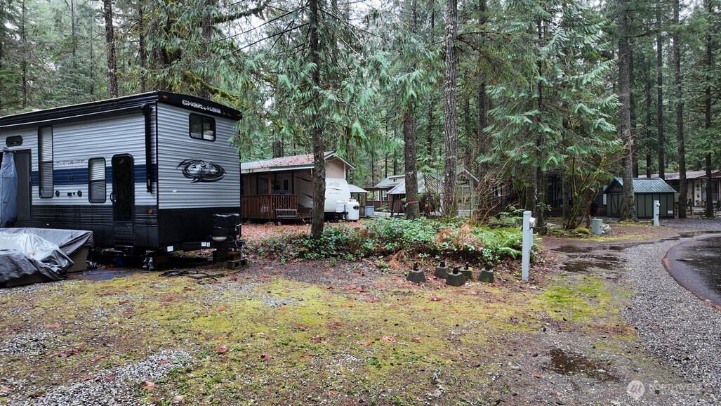 134 Jasper Trail Deming, WA 98244 - Photo 13 of 20 a view of a house with a yard and sitting area