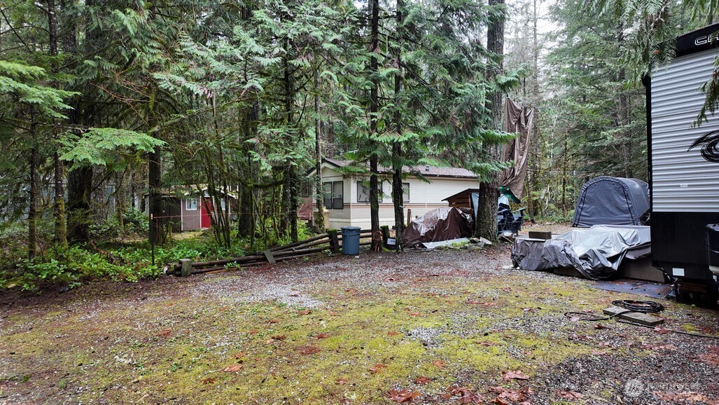 134 Jasper Trail Deming, WA 98244 - Photo 14 of 20 a view of a house with a backyard and sitting area