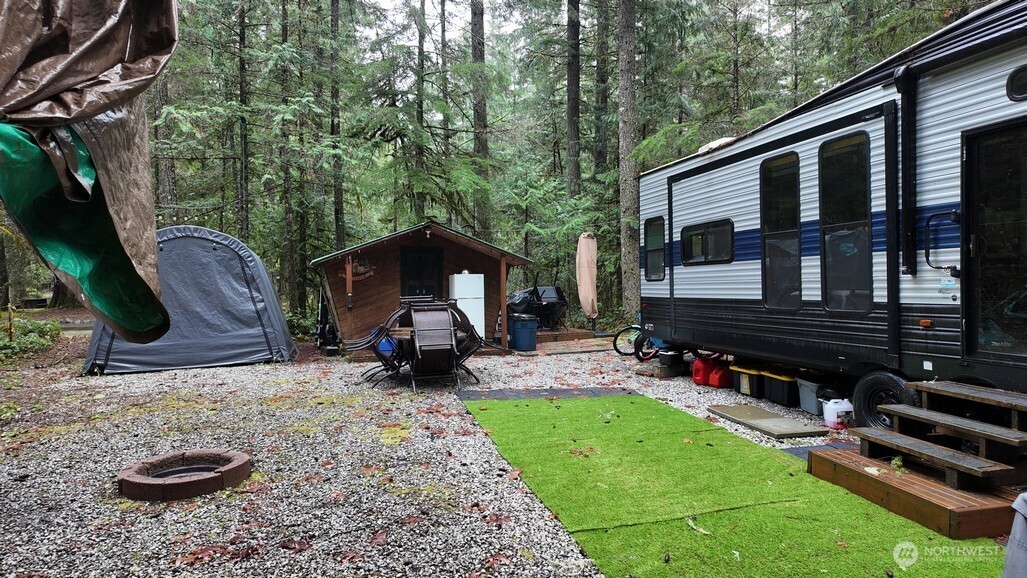 134 Jasper Trail Deming, WA 98244 - Photo 2 of 20 a view of a house with backyard and sitting area