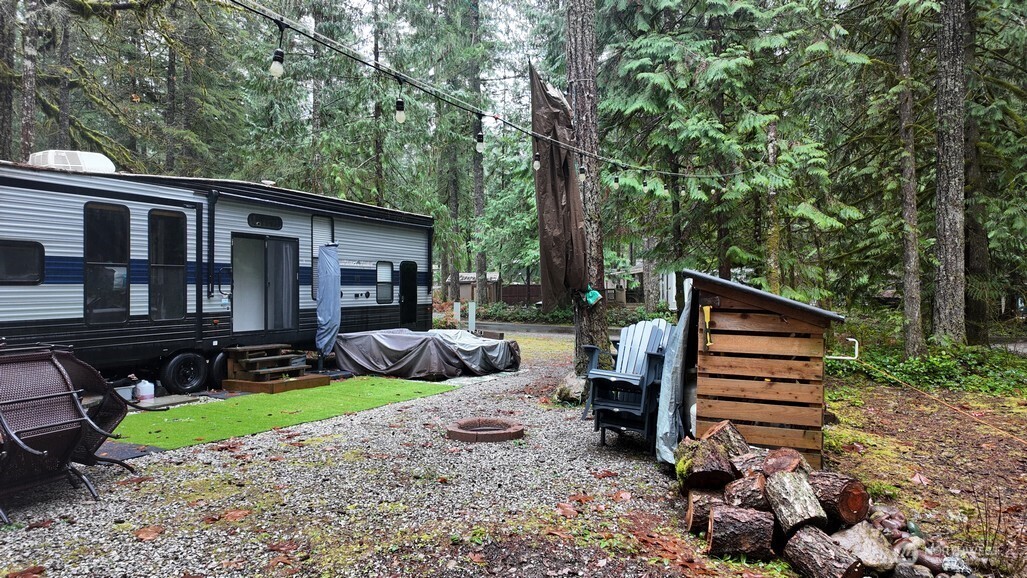 134 Jasper Trail Deming, WA 98244 - Photo 3 of 20 a view of a house with backyard and sitting area