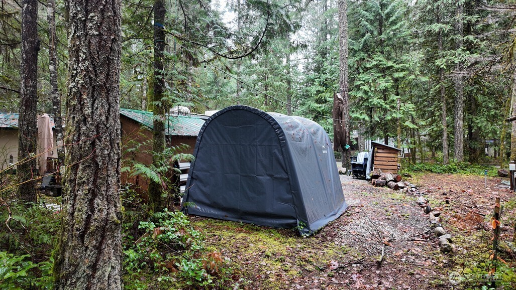 134 Jasper Trail Deming, WA 98244 - Photo 6 of 20 a view of backyard with outdoor seating and trees