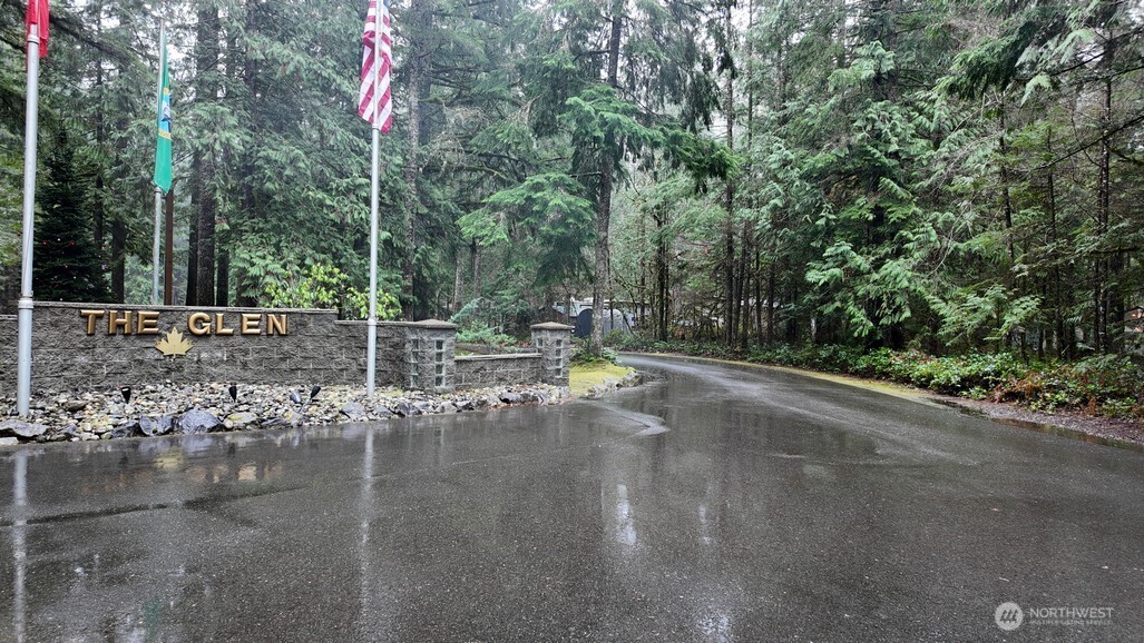 134 Jasper Trail Deming, WA 98244 - Photo 8 of 20 a view of a street with trees and bushes