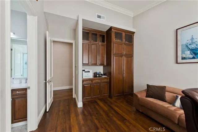 a bathroom with a granite countertop bathtub shower and sink