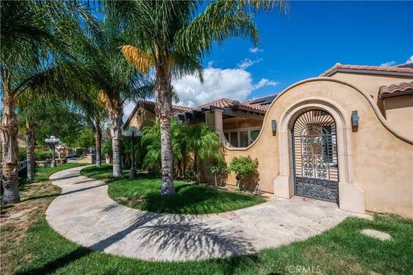 a view of living room with furniture and floor to ceiling windows