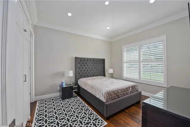 a bathroom with a sink shower and a mirror