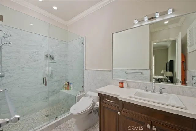 a view of a patio with dining table and chairs with wooden floor and fence