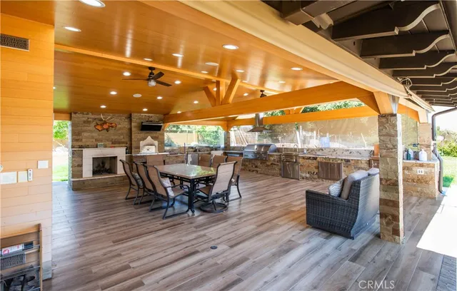 a view of a house with pool and a yard