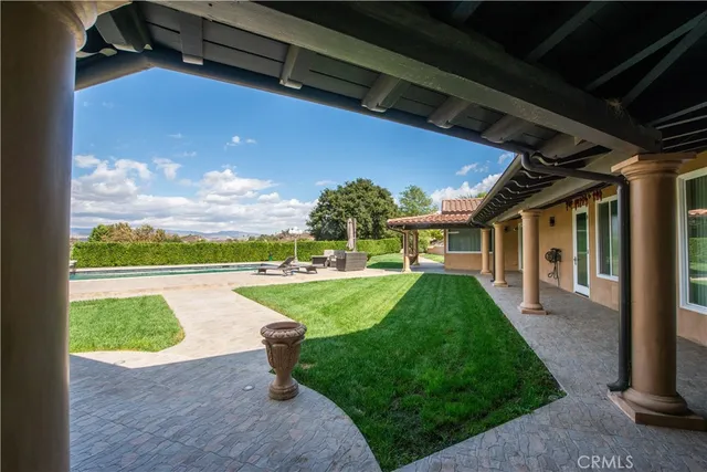 a view of a balcony with an outdoor space