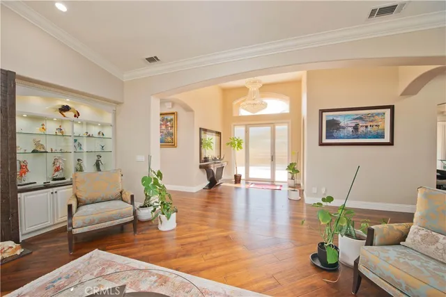 a living room with furniture a window and a fireplace