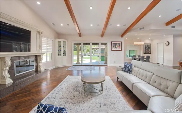 a living room with furniture and a window