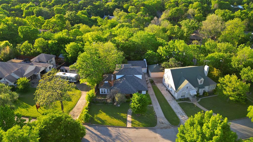 1439 Jr Drive Dallas, TX 75208 - Photo 35 of 39 an aerial view of a house with a yard swimming pool and outdoor seating