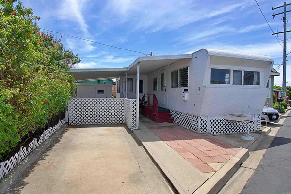 a front view of a house with a balcony