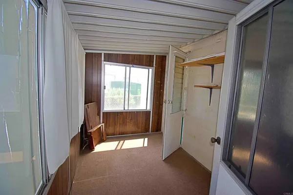 a view of an empty room and a gallery