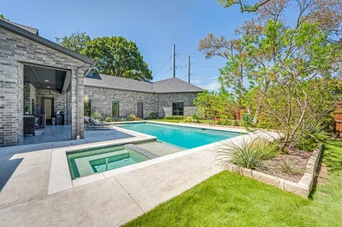 a view of a house with swimming pool