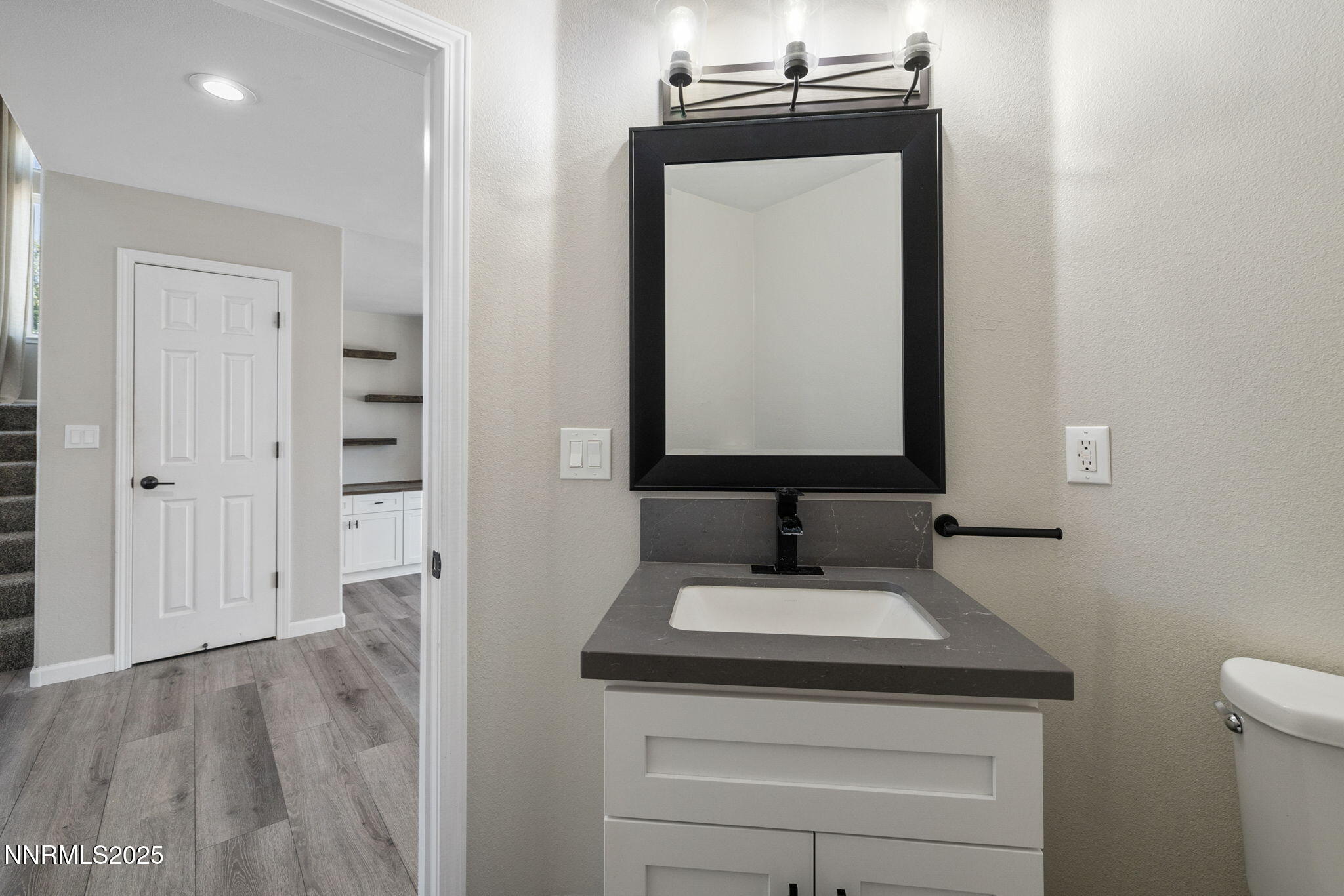 7510 Michaela Drive Reno, NV 89511 - Photo 13 of 33 a bathroom with a sink and a mirror