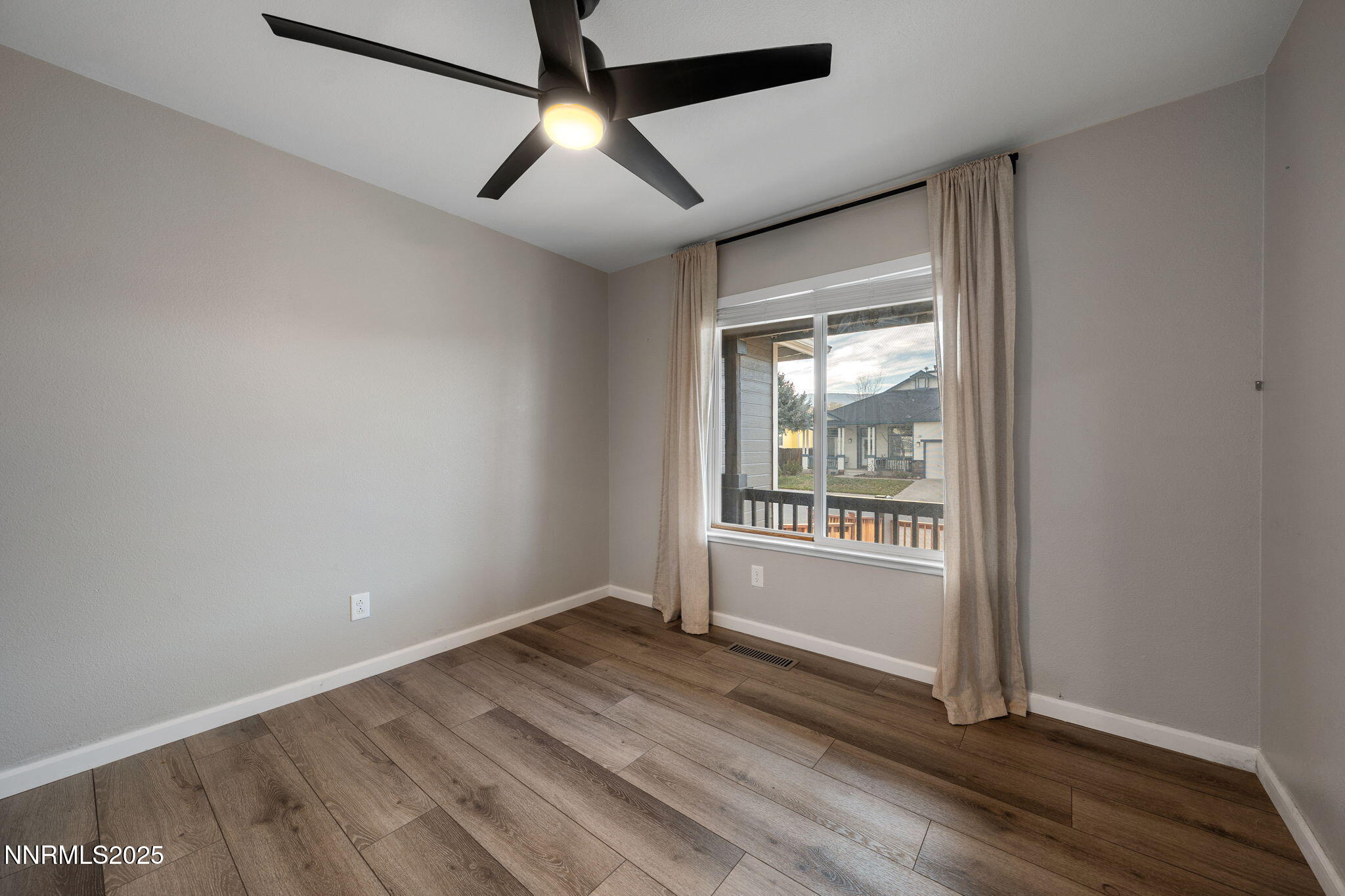 7510 Michaela Drive Reno, NV 89511 - Photo 10 of 33 a view of an empty room with a window