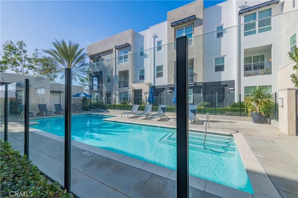 a view of a tall building from a patio