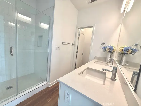 a bathroom with a sink and mirror