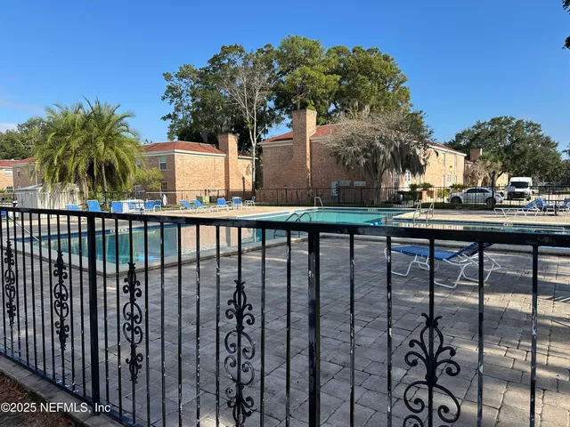 a view of a street from a balcony