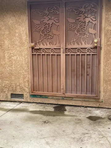 a view of a swimming pool with a yard