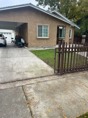 a view of a house with a patio