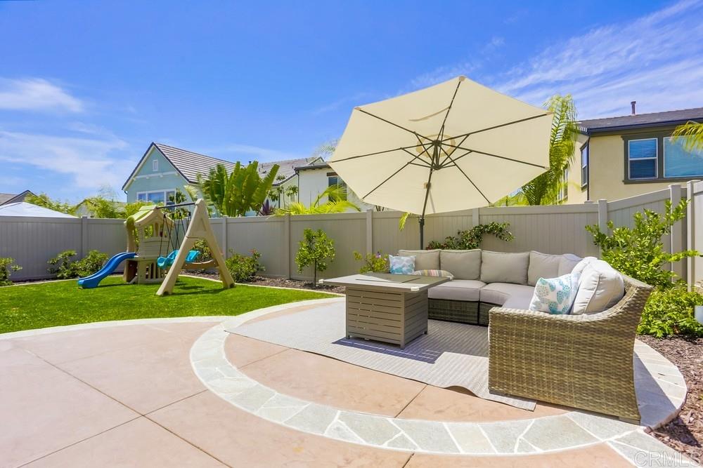 13416 Red Oak Way San Diego, CA 92130 - Photo 23 of 24 a view of a house with backyard and sitting area