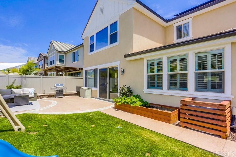 13416 Red Oak Way San Diego, CA 92130 - Photo 24 of 24 a house with garden in front of it