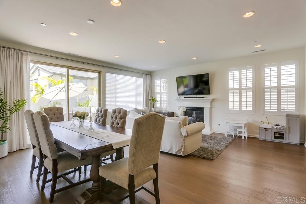 13416 Red Oak Way San Diego, CA 92130 - Photo 4 of 24 a view of a dining room with furniture window and outside view