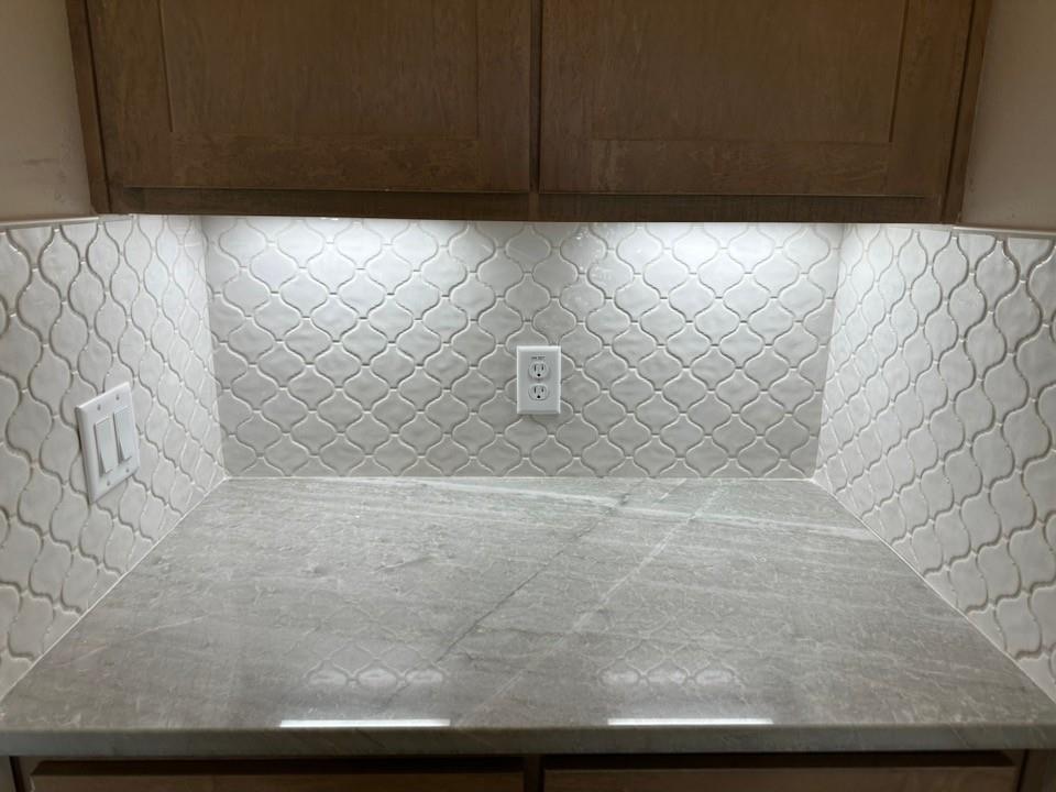 205 Cobb Road Leonard, TX 75452 - Photo 13 of 28 Kitchen countertop featuring a light gray stone-finish surface