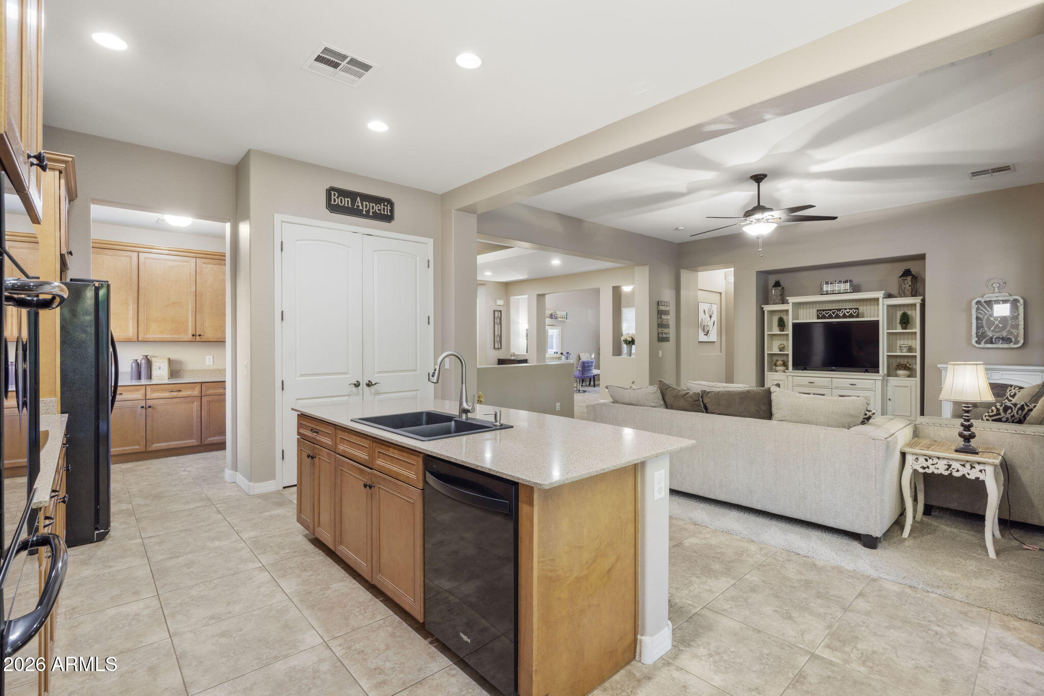 3831 East Weather Vane Road Gilbert, AZ 85296 - Photo 15 of 64 a large white kitchen with a large window and stainless steel appliances