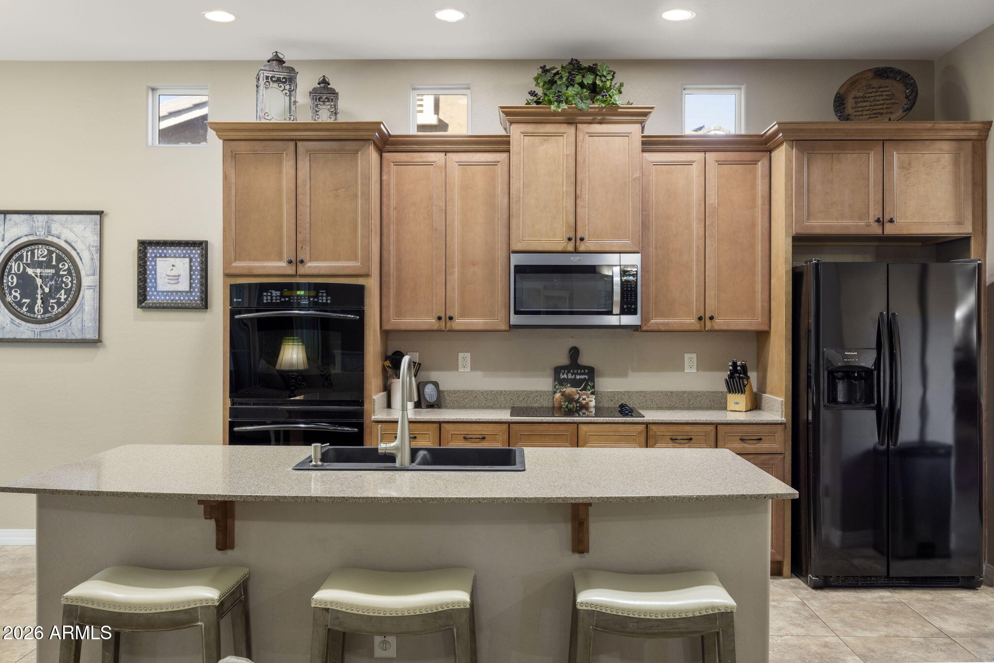 3831 East Weather Vane Road Gilbert, AZ 85296 - Photo 19 of 64 a kitchen with stainless steel appliances a sink cabinets and refrigerator